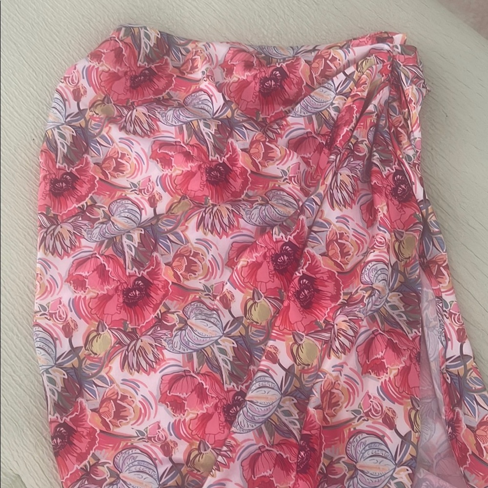 Floral Pink skirt with colorful pattern.